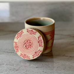 Speckled Clay Jar with Red Glaze Decoration